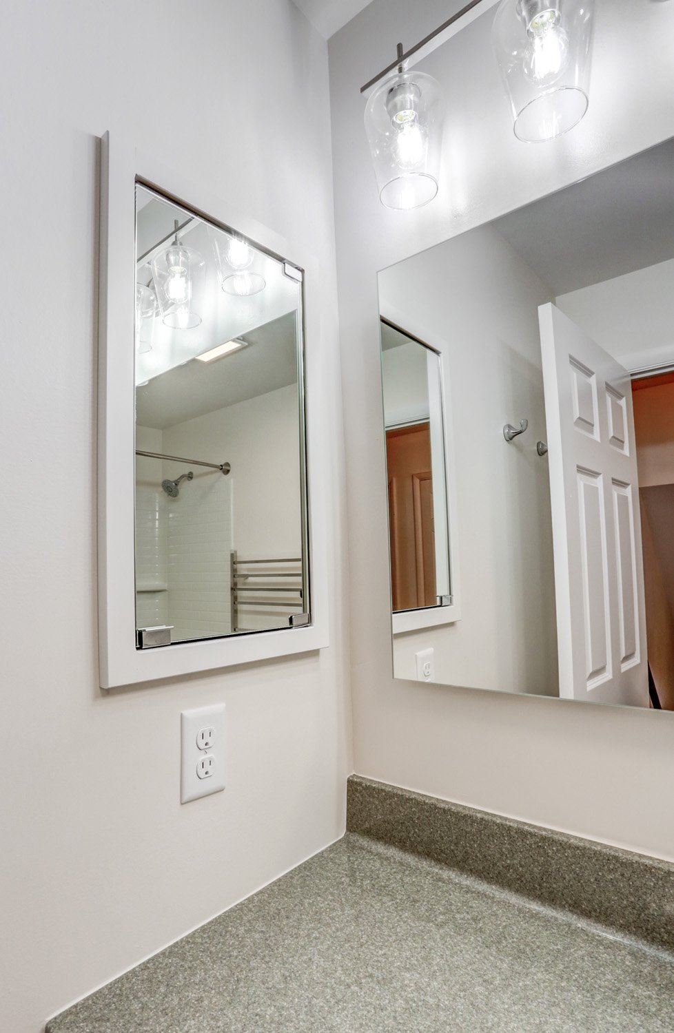 Mirror and medicine cabinet in Bloomingdale guest bathroom remodel