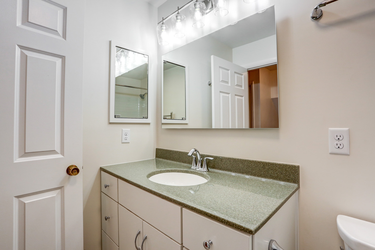 Bloomingdale guest bathroom remodel With cultured marble vanity top