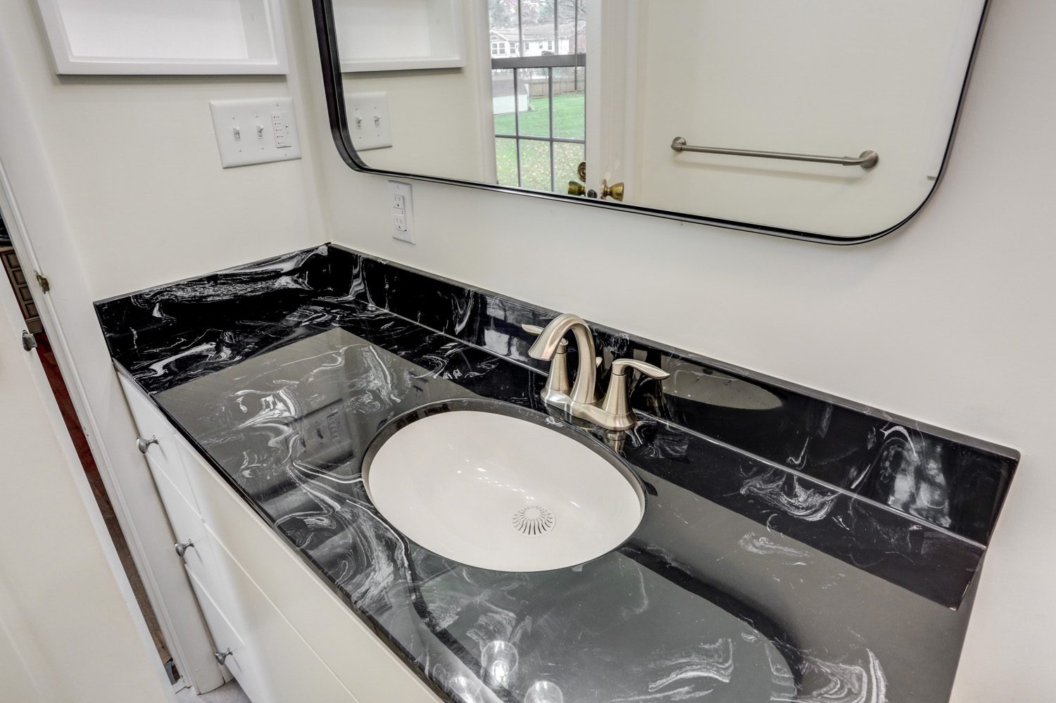 Black Cultured Marble vanity top in Bloomingdale Master Bathroom Remodel