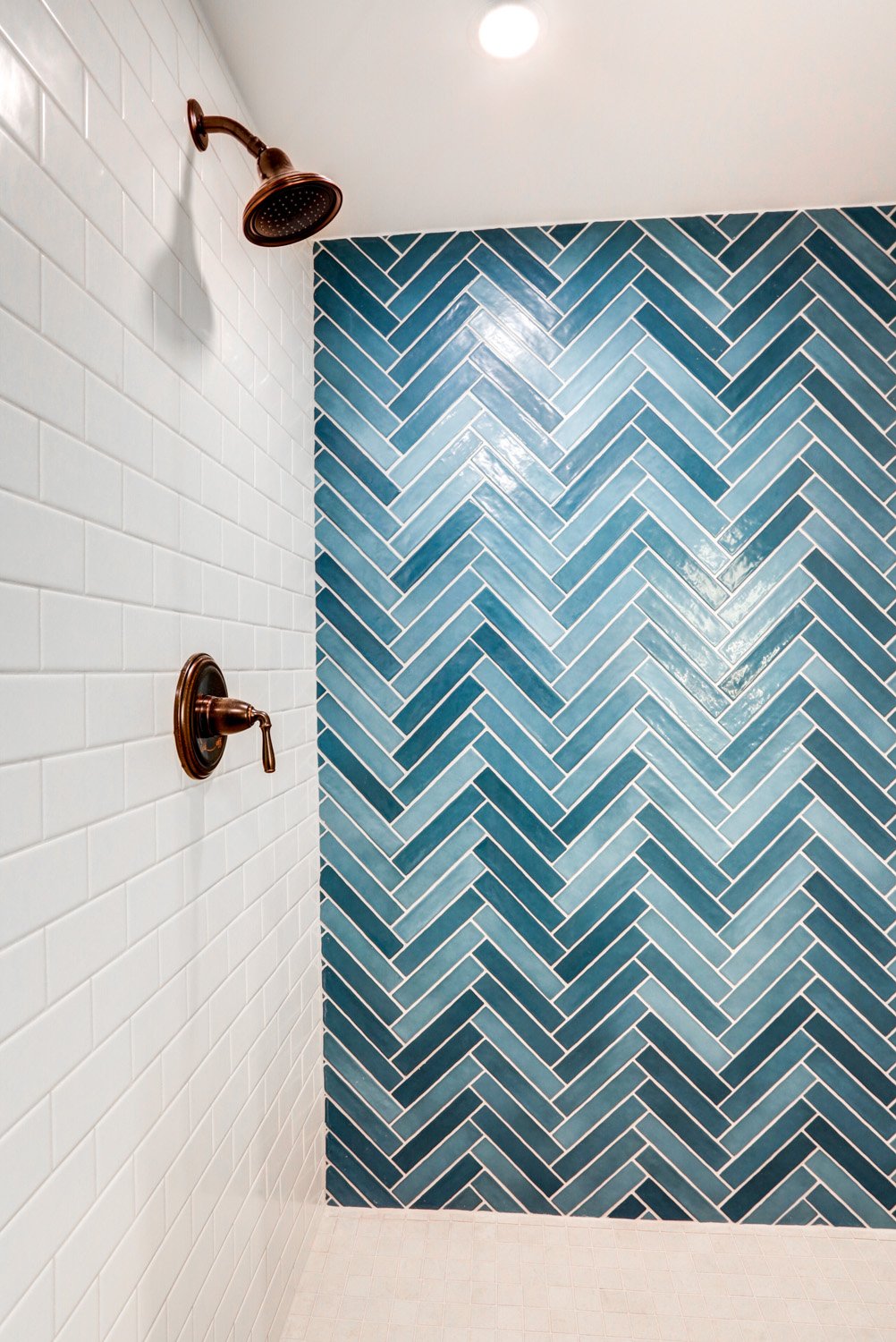 blue tile design in lancaster basement bathroom shower