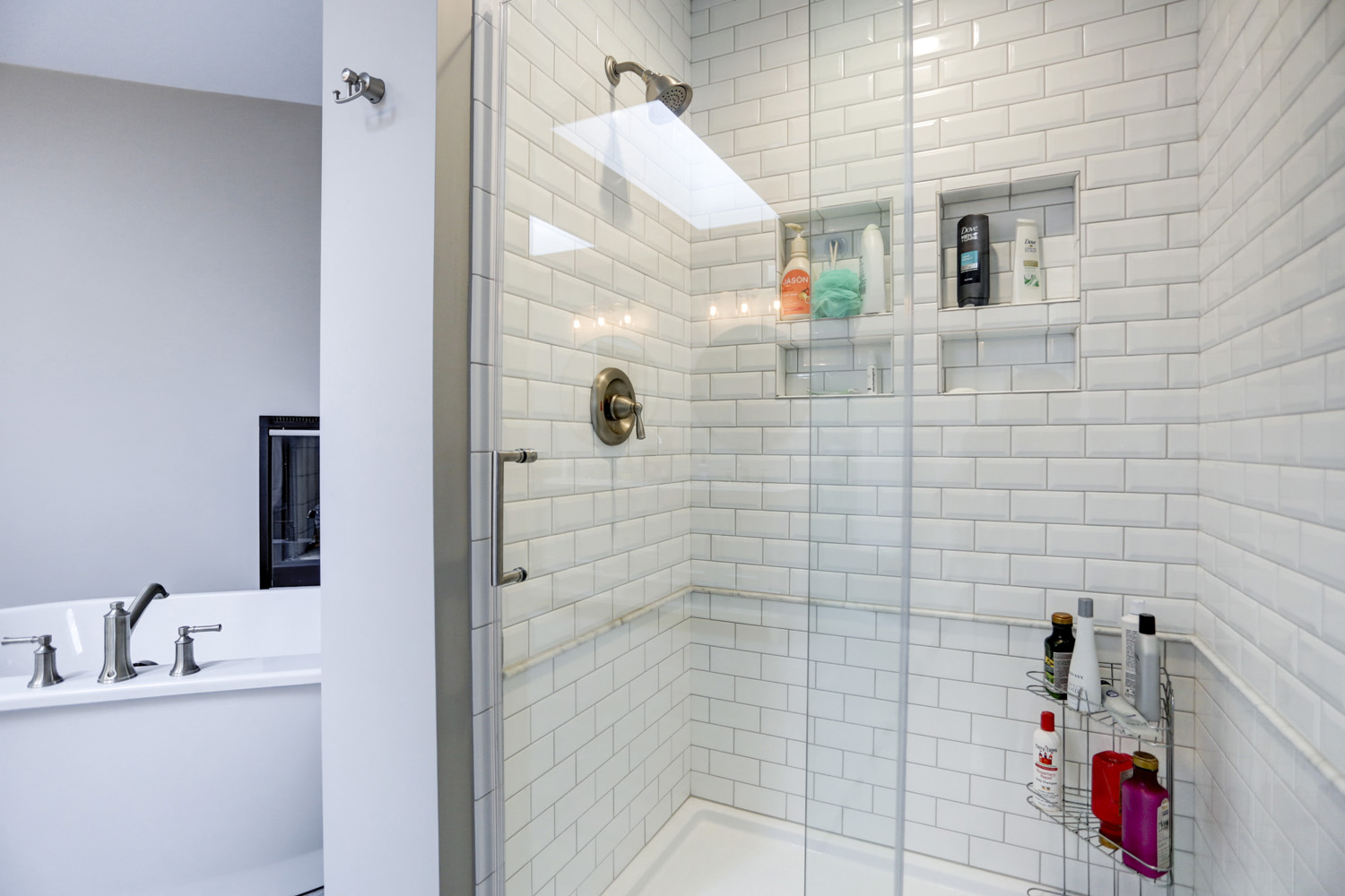 Tiled shower with glass doors in Manheim Township Master Bathroom Remodel